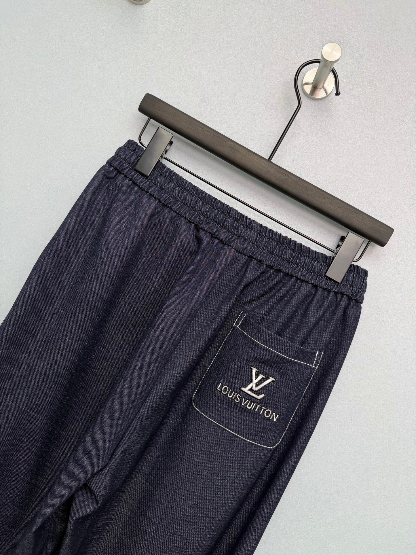 26. Wide-Leg Trousers with Side Drawstrings and Exposed Stitching