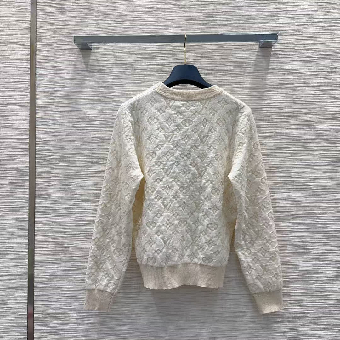 New monogram sweater