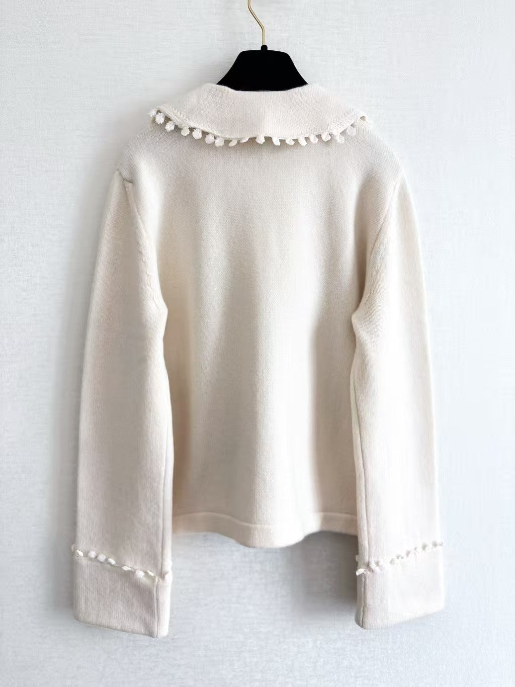 New openwork pocket Peter Pan collar cardigan