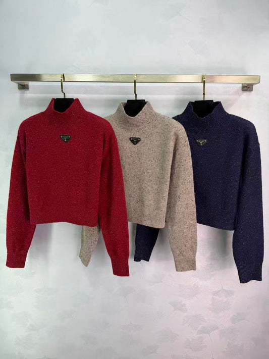 Stand-up collar triangular logo sweater