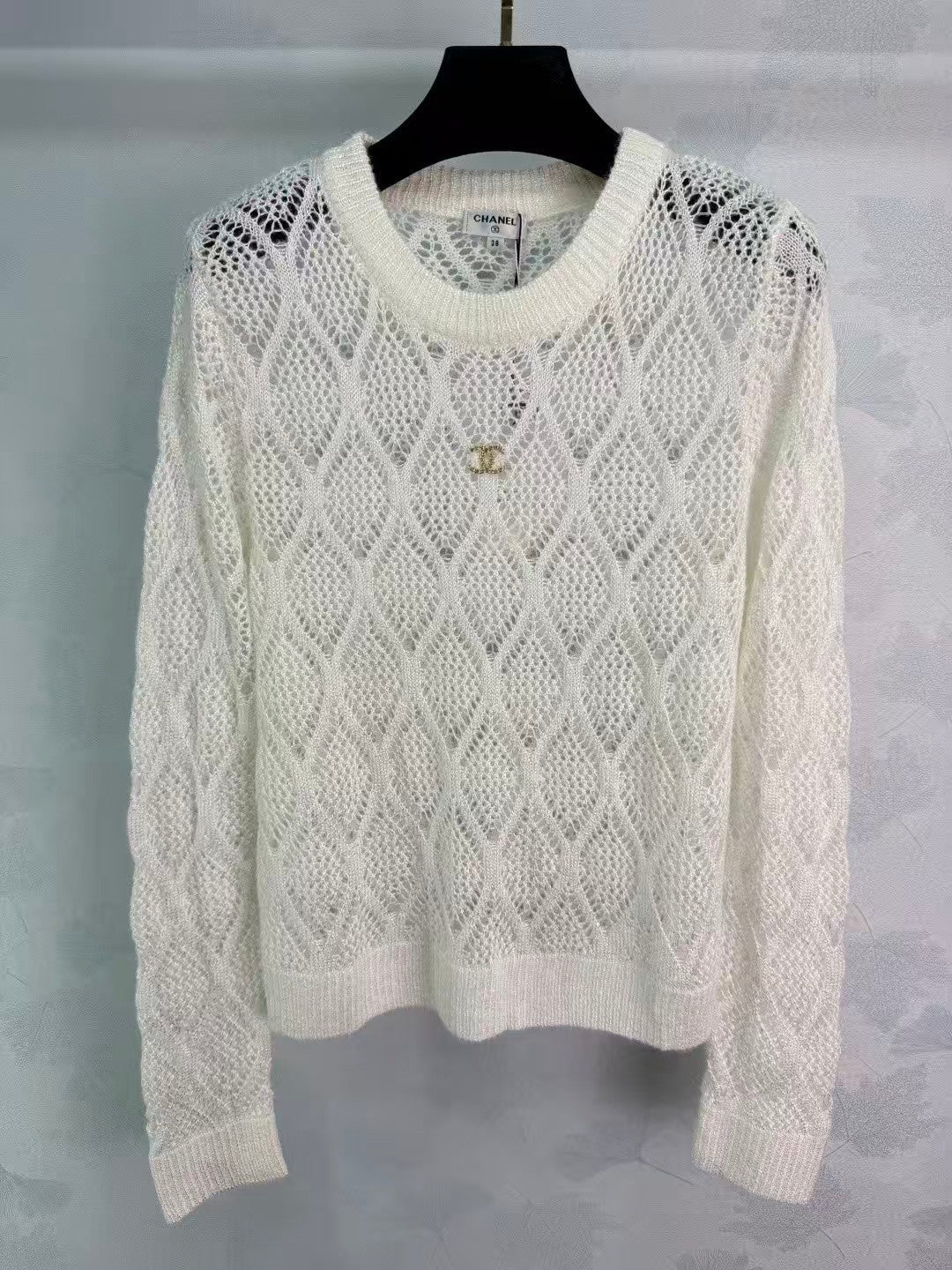 Sequined diamond-patterned openwork pullover knit sweater