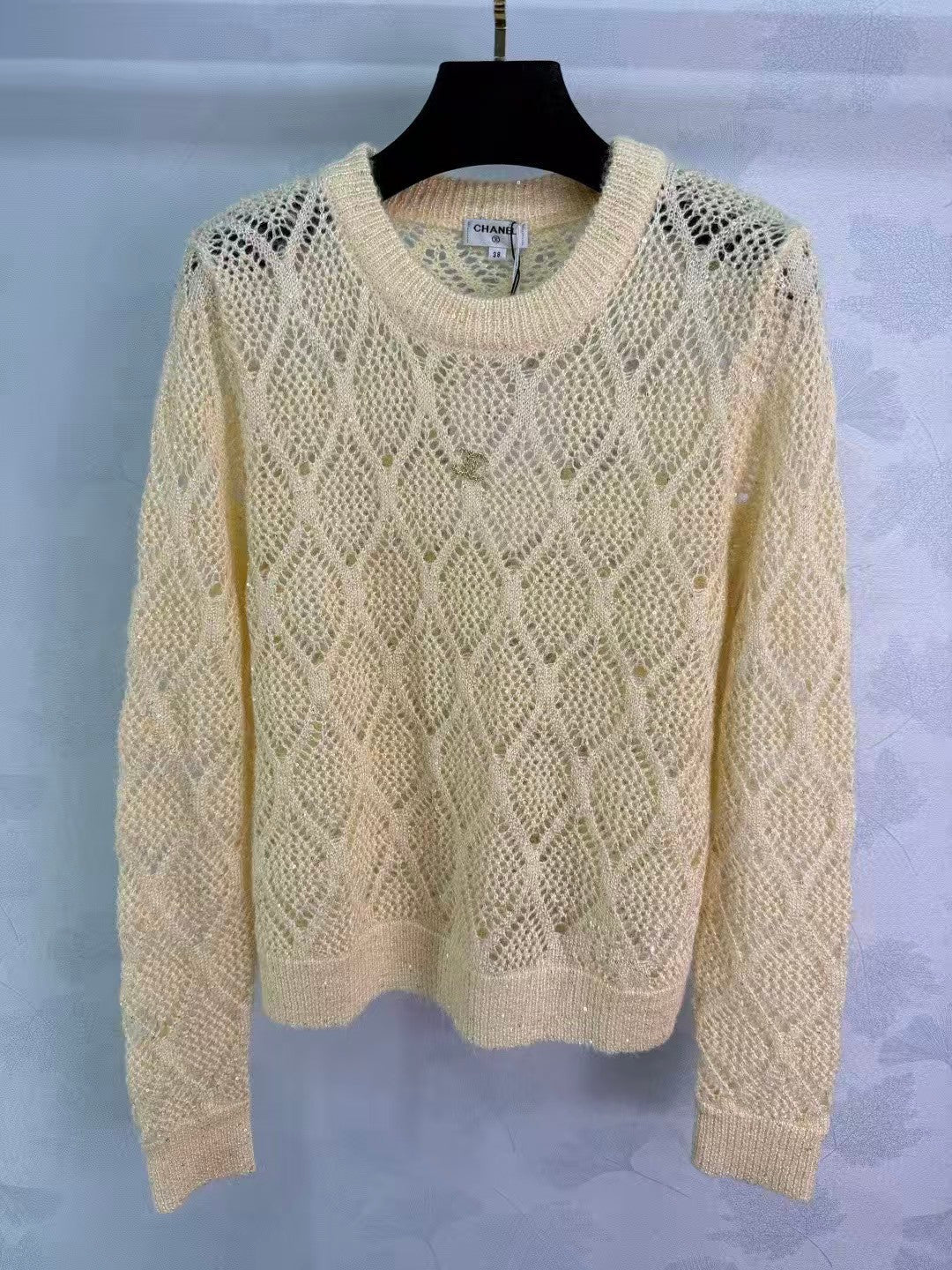 Sequined diamond-patterned openwork pullover knit sweater