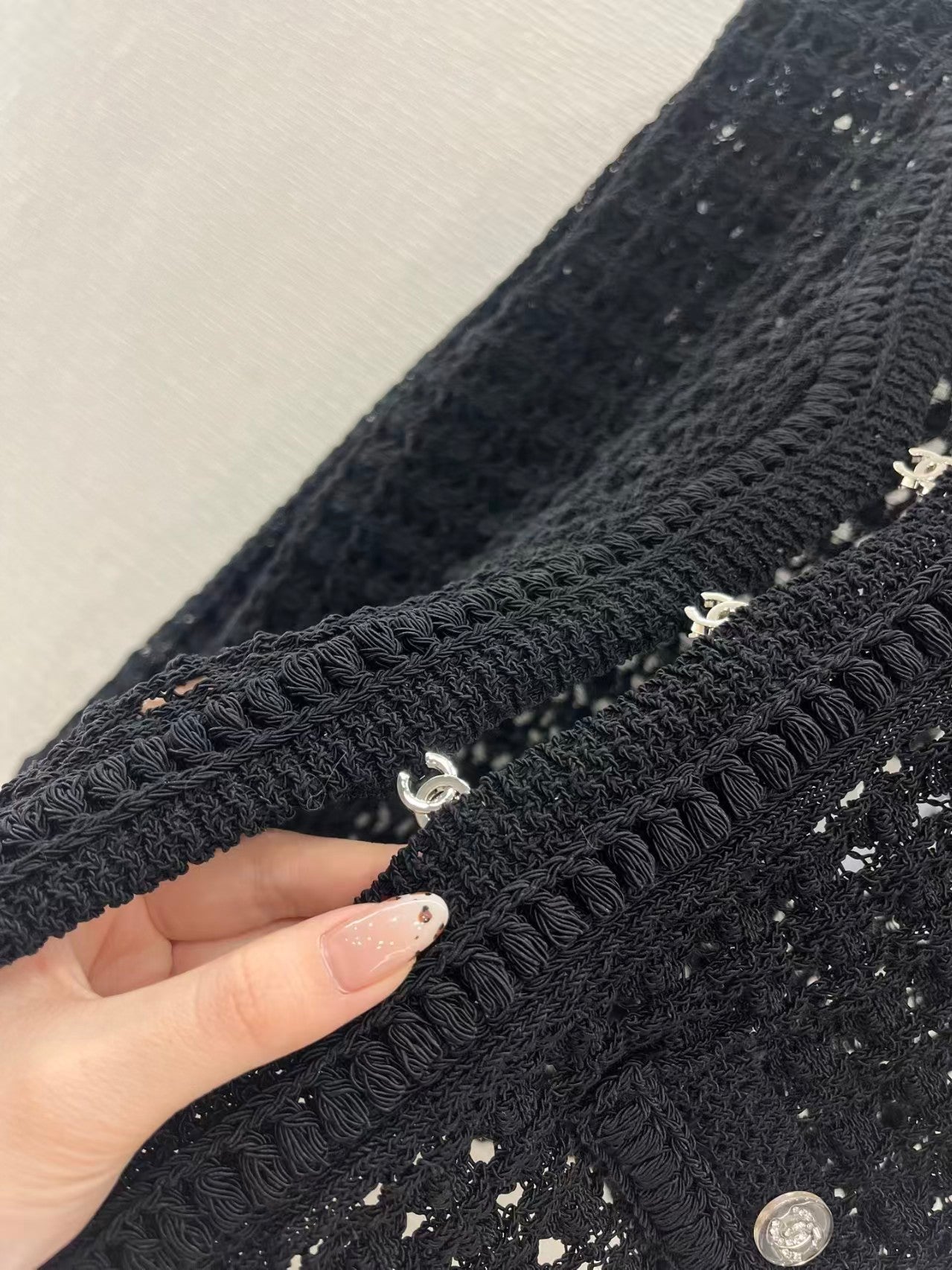 Openwork short-sleeved knitted cardigan