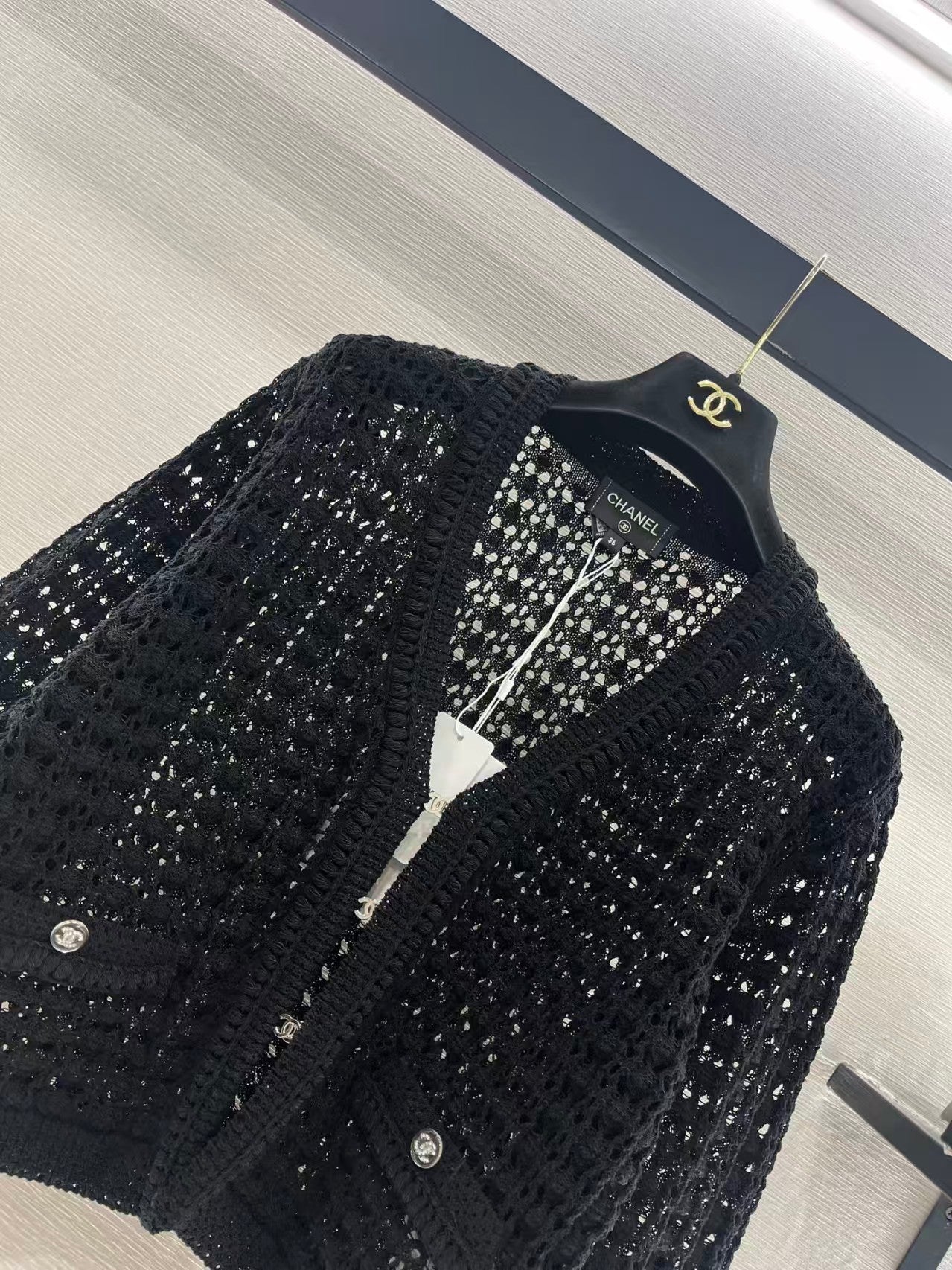 Openwork short-sleeved knitted cardigan