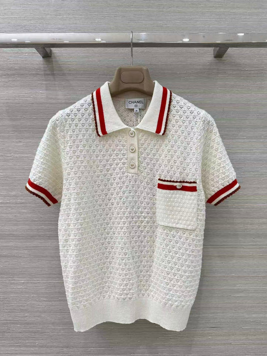 Retro-style polo shirt with cut-out details.