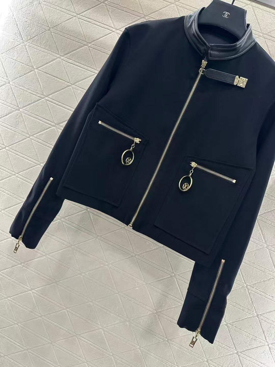 Jacket with zippered leather collar