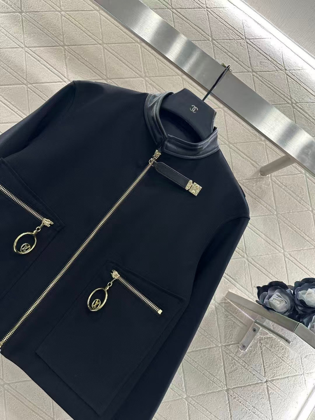 Jacket with zippered leather collar