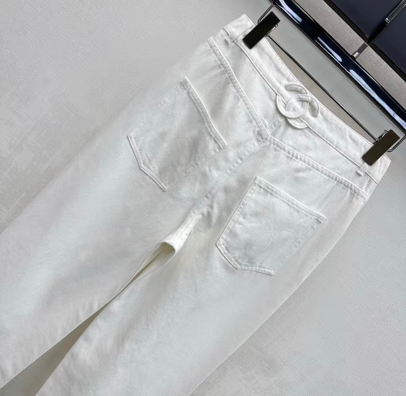 26SS Embroidered Denim Trousers with Schoolbag-Style Buckles