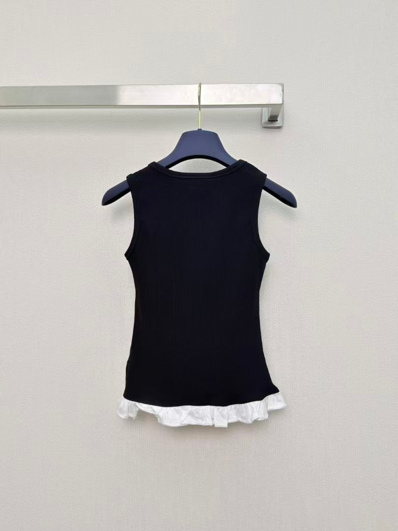 26 New Ruffled Sleeveless Top