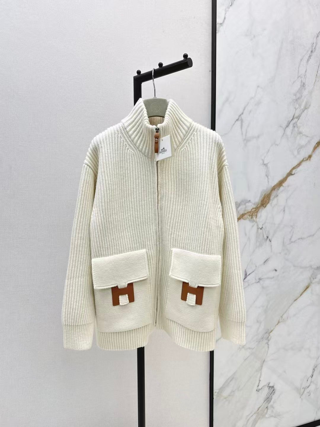 New knit jacket with H-motif pocket detail