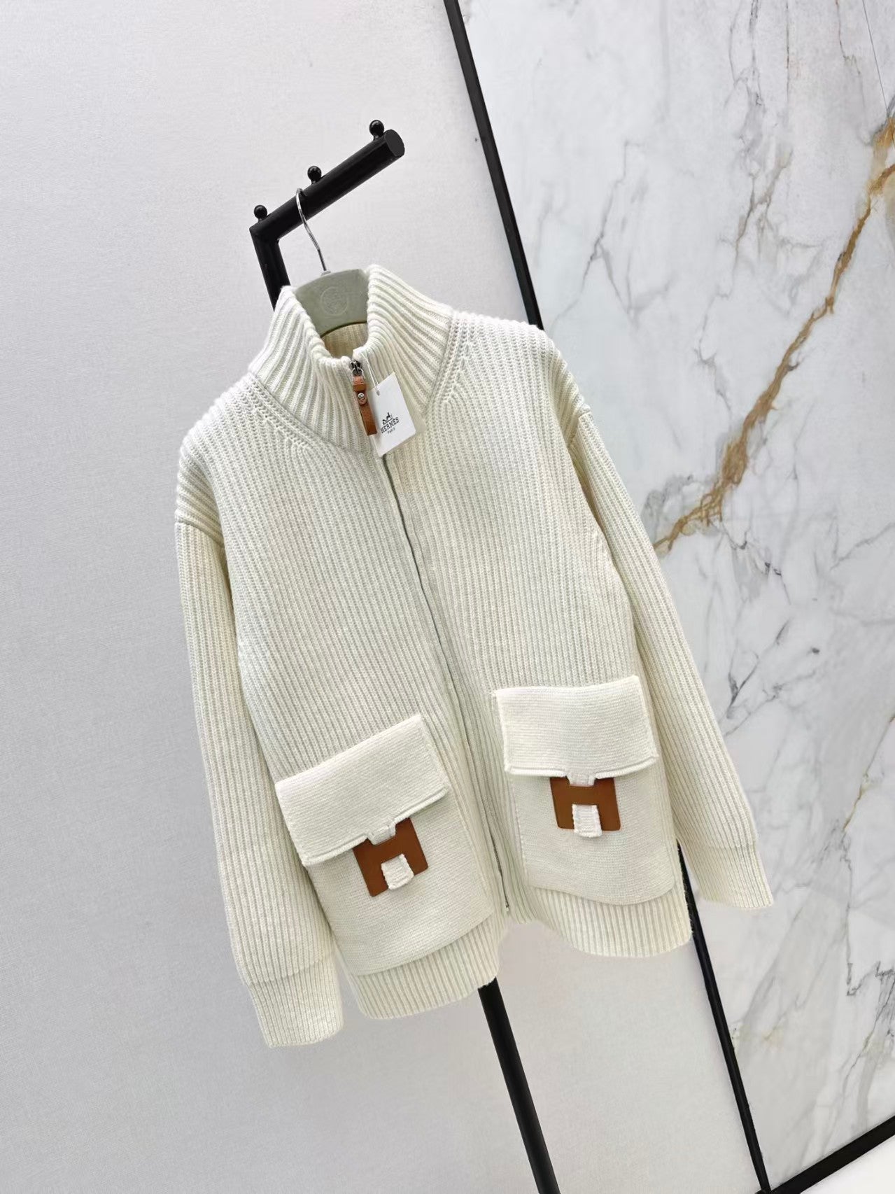New knit jacket with H-motif pocket detail