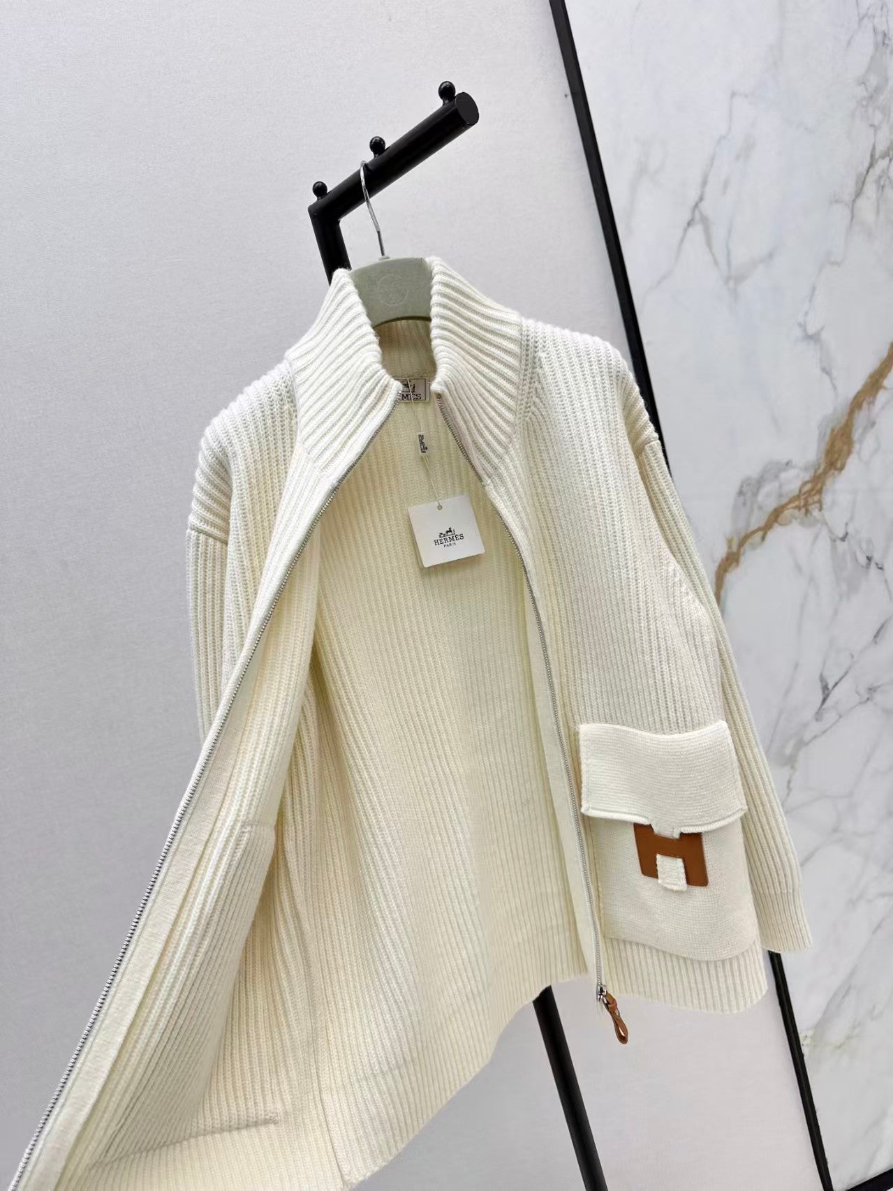 New knit jacket with H-motif pocket detail