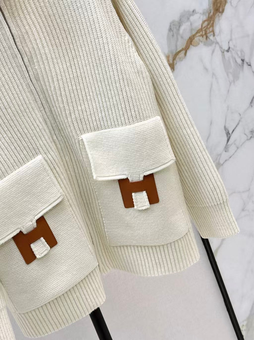 New knit jacket with H-motif pocket detail