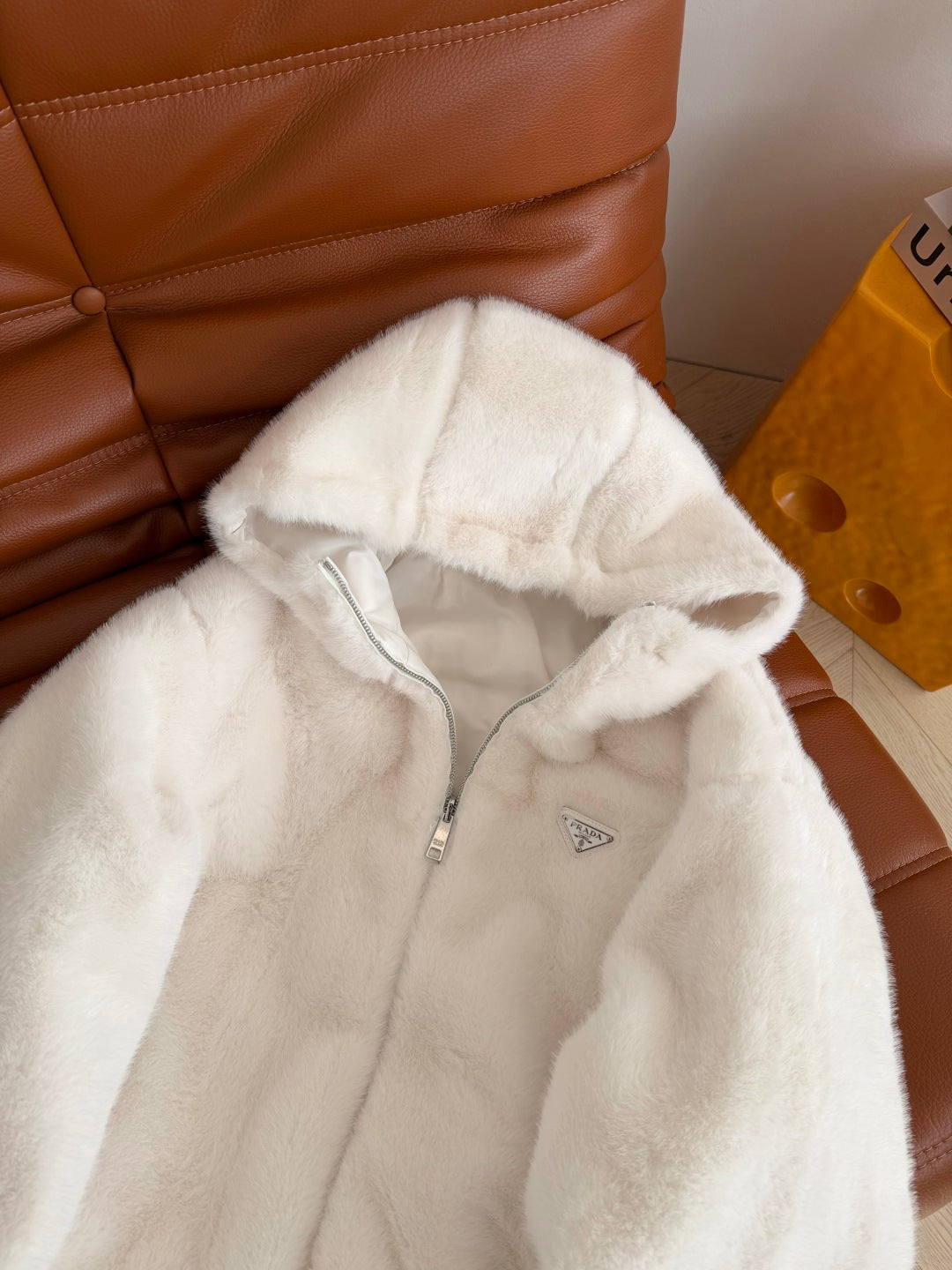 Hooded eco-friendly faux fur coat