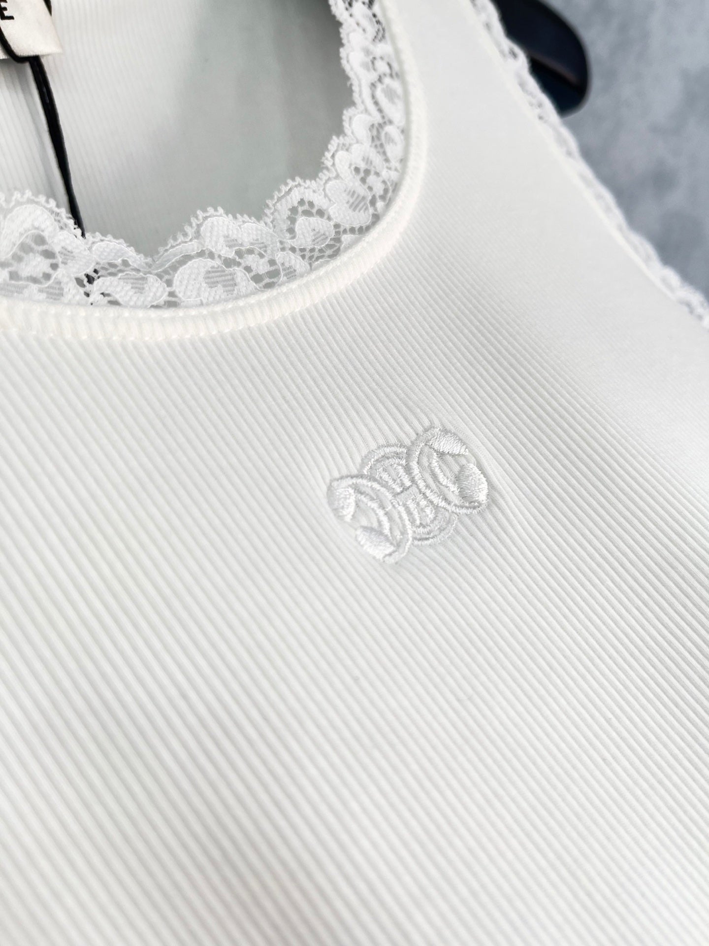 Lace-paneled embroidered vest