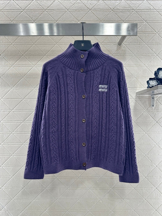 Cable knit cardigan with logo