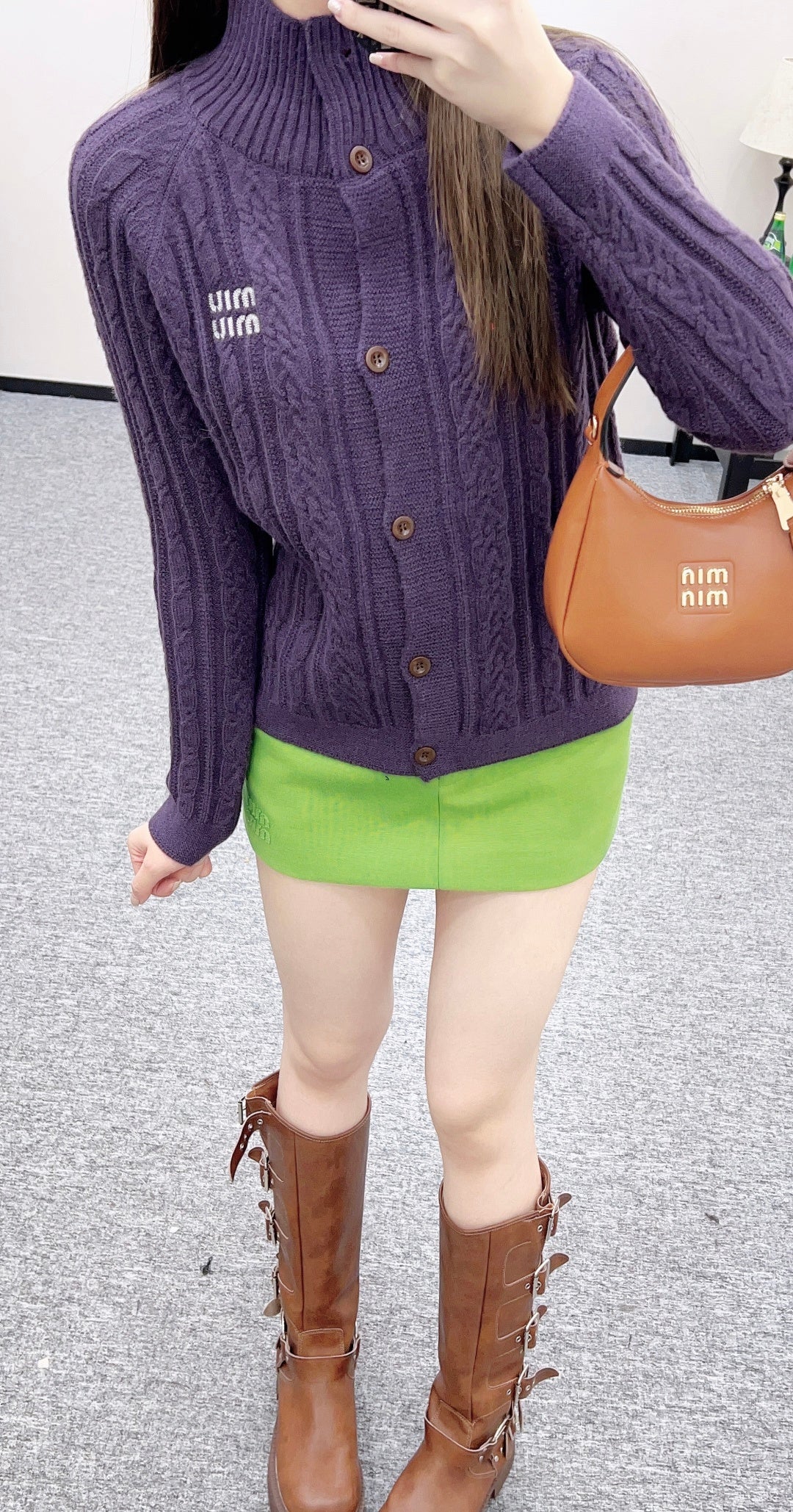 Cable knit cardigan with logo