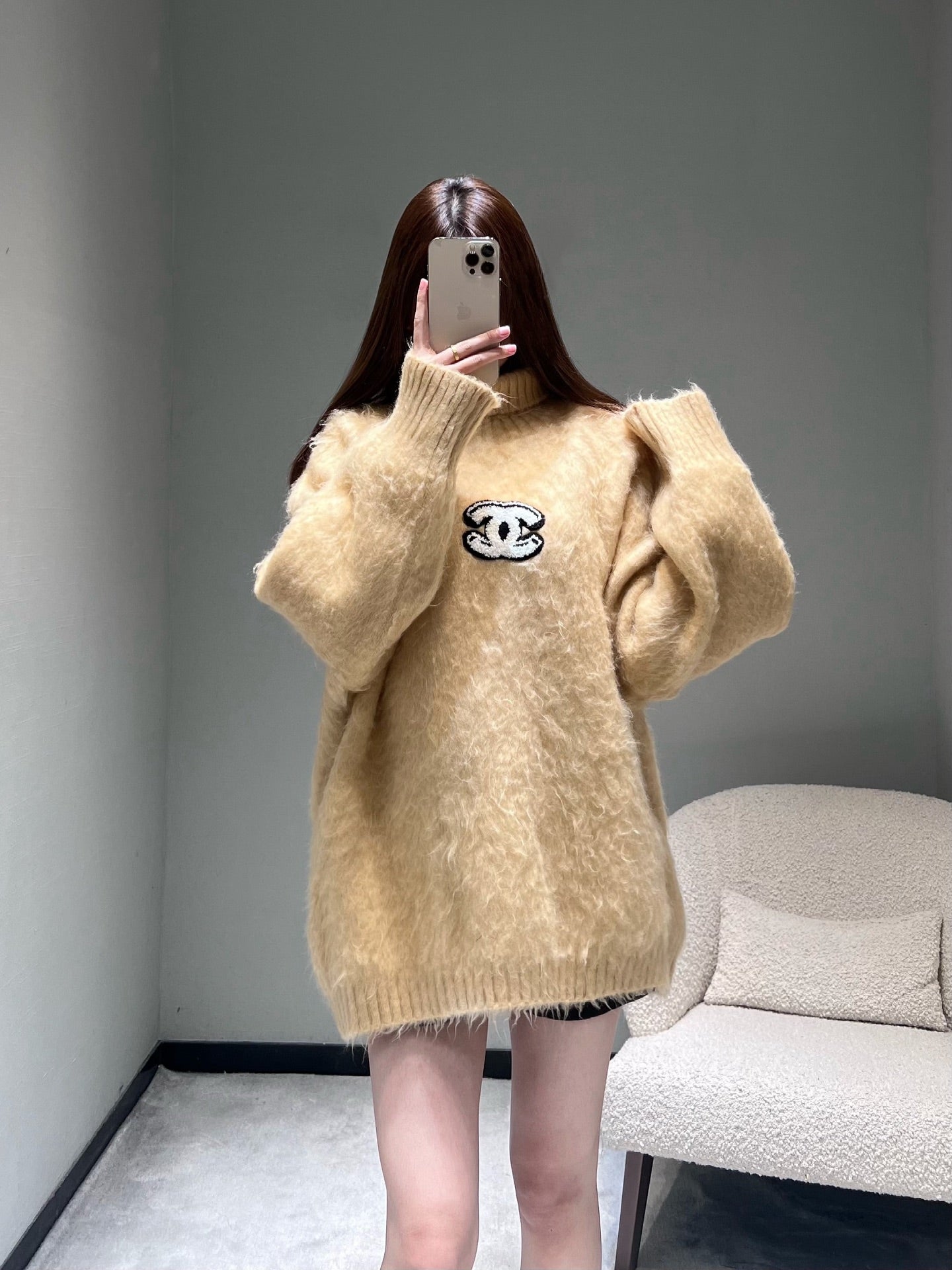 New camel-colored knitted sweater