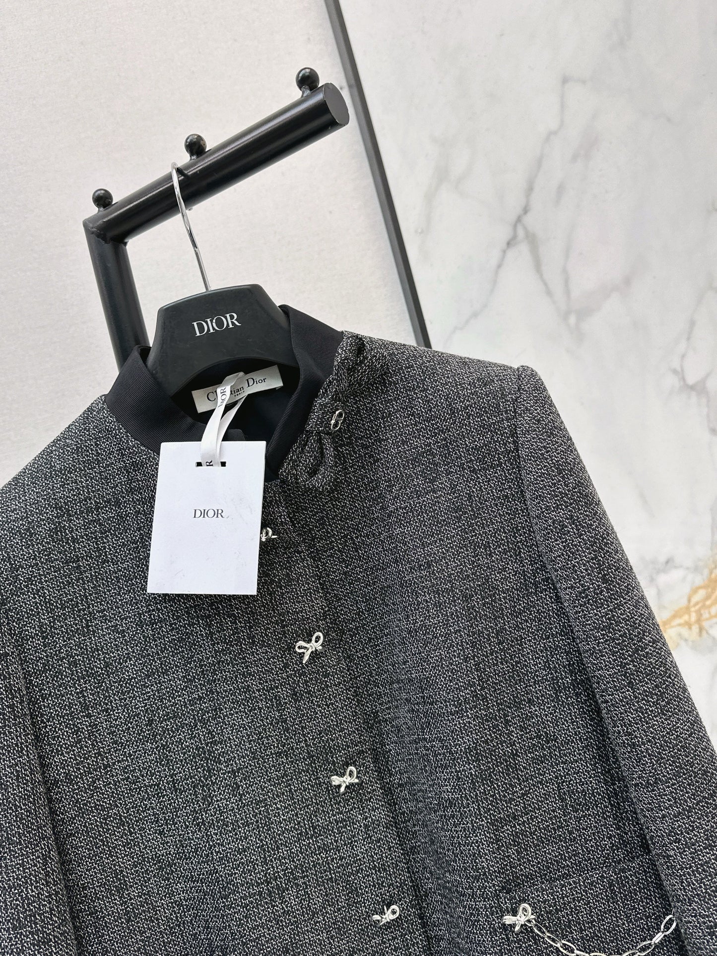 New gray jacket with chain embellishments