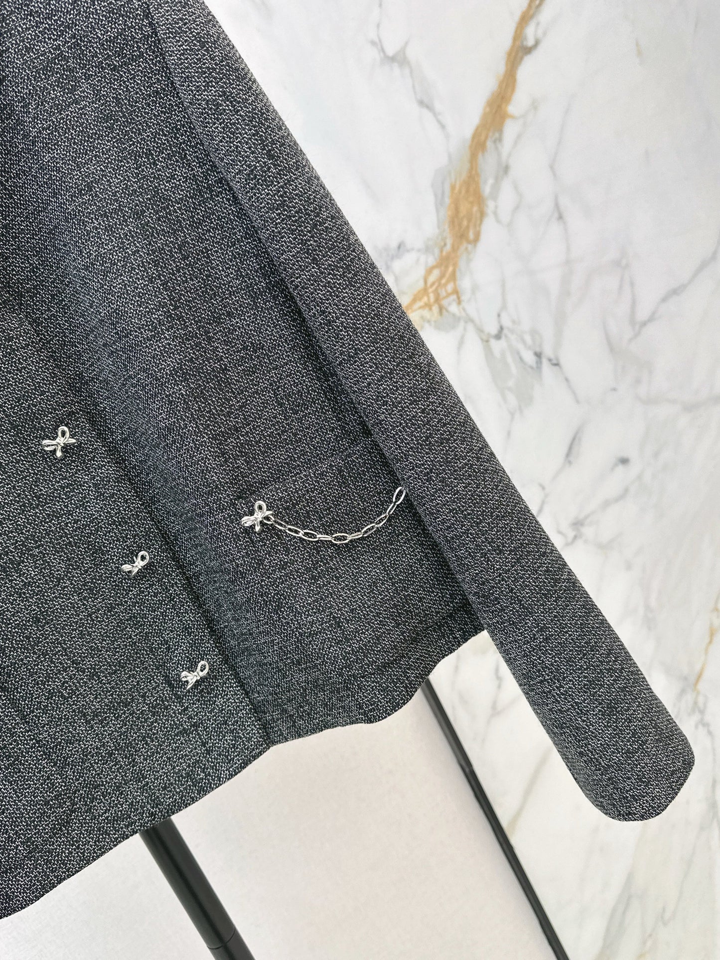 New gray jacket with chain embellishments
