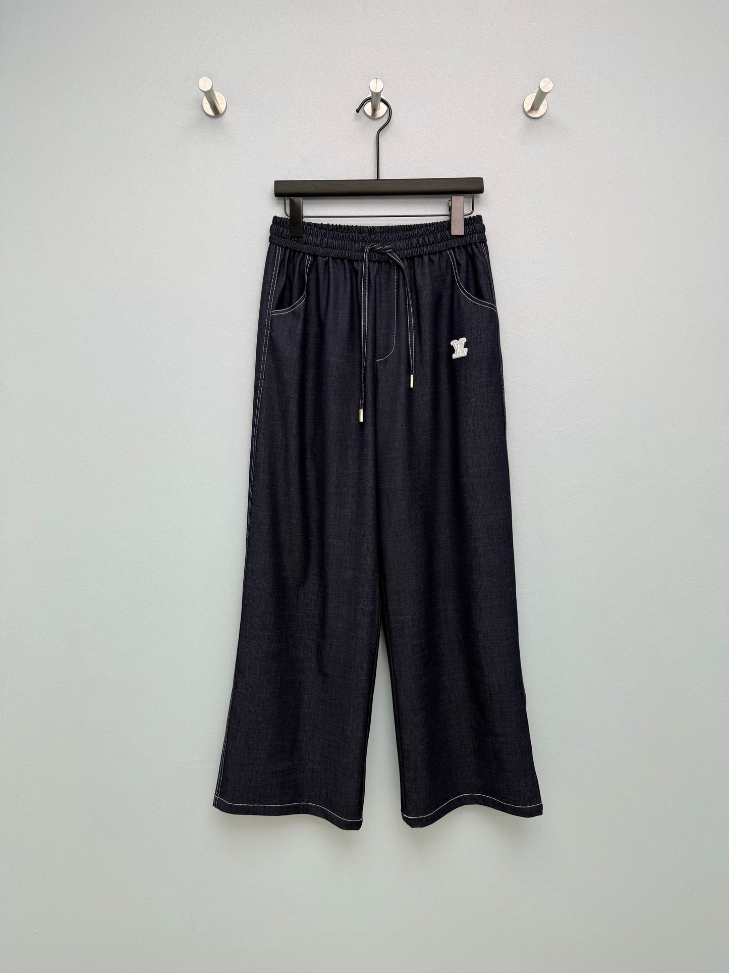 26. Wide-Leg Trousers with Side Drawstrings and Exposed Stitching