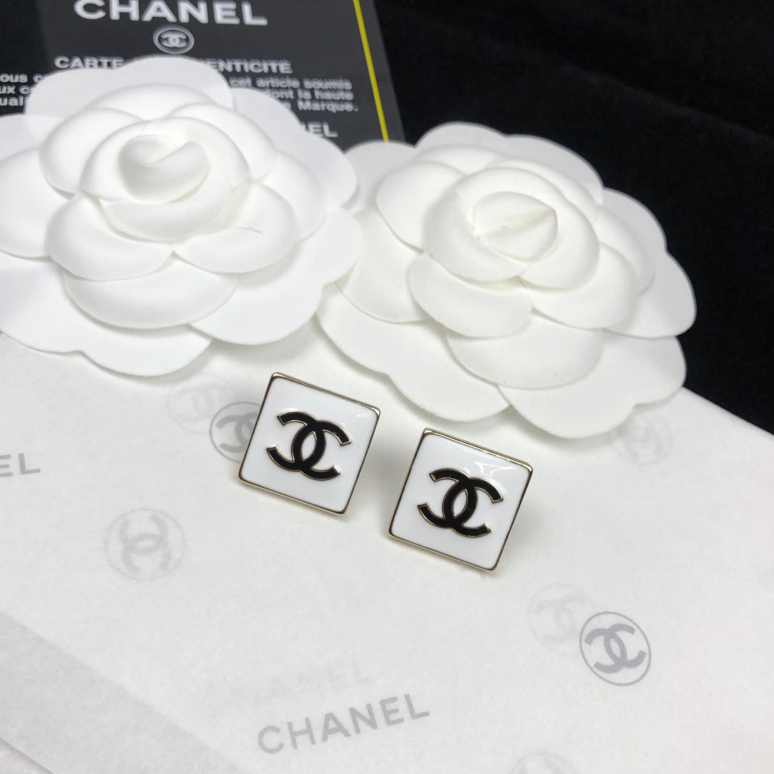 White enamel black square stud earrings