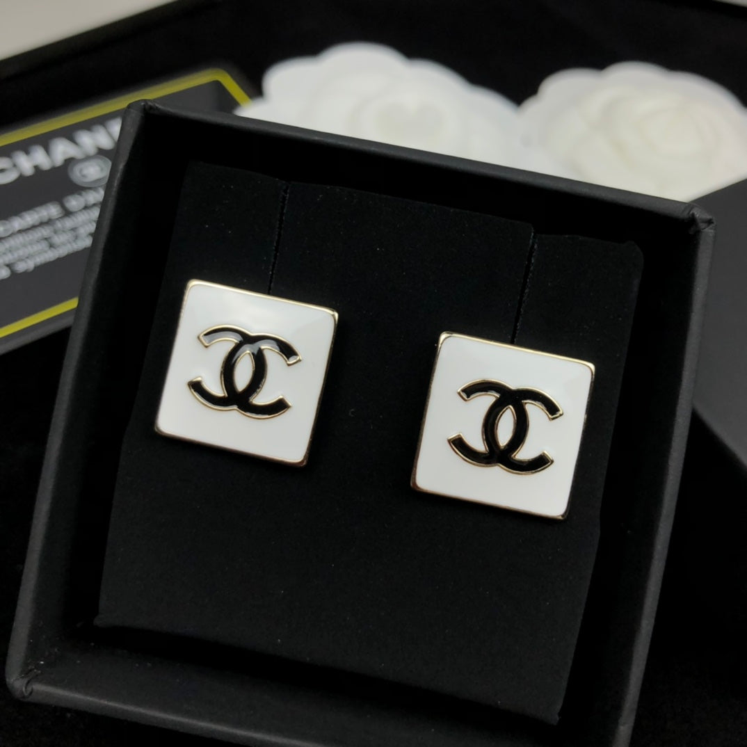 White enamel black square stud earrings